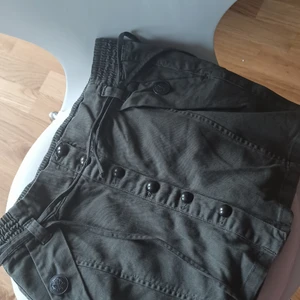 Mörkgröna jeans minikjol - Nästan som nytt! Storlek XS 34/36