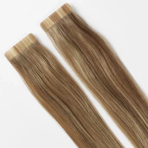 100g tape extensions - Säljer 100 gr äkta hår i tape extensions. Använt i endast några timmar vid 1 tillfälle. Rena och som nya. Färg: askblond. Har ljusare och mörkare slingor eftersom jag då hade ”balayage”. De är köpta för 3000 kr. Längd: 50 cm