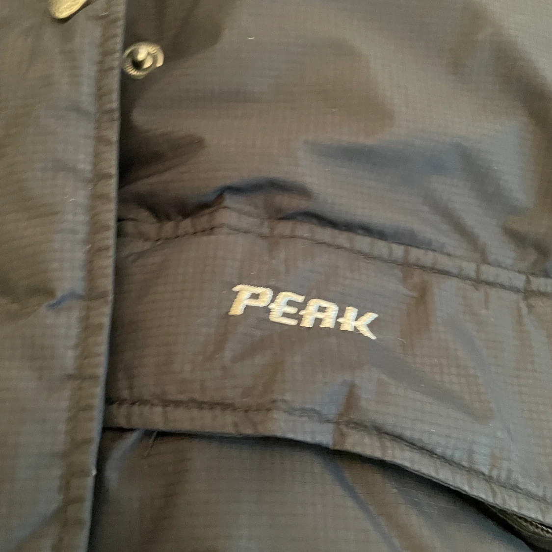 Svart Dun jacka från peak performance  - 91