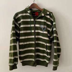 Grön randig zipup hoodie, använt skick 