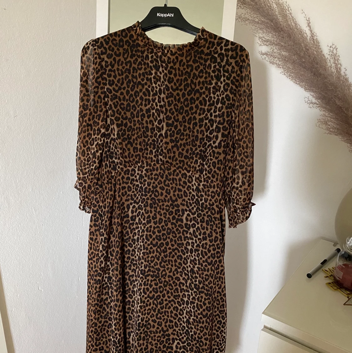 Leopard klänning storlek 40