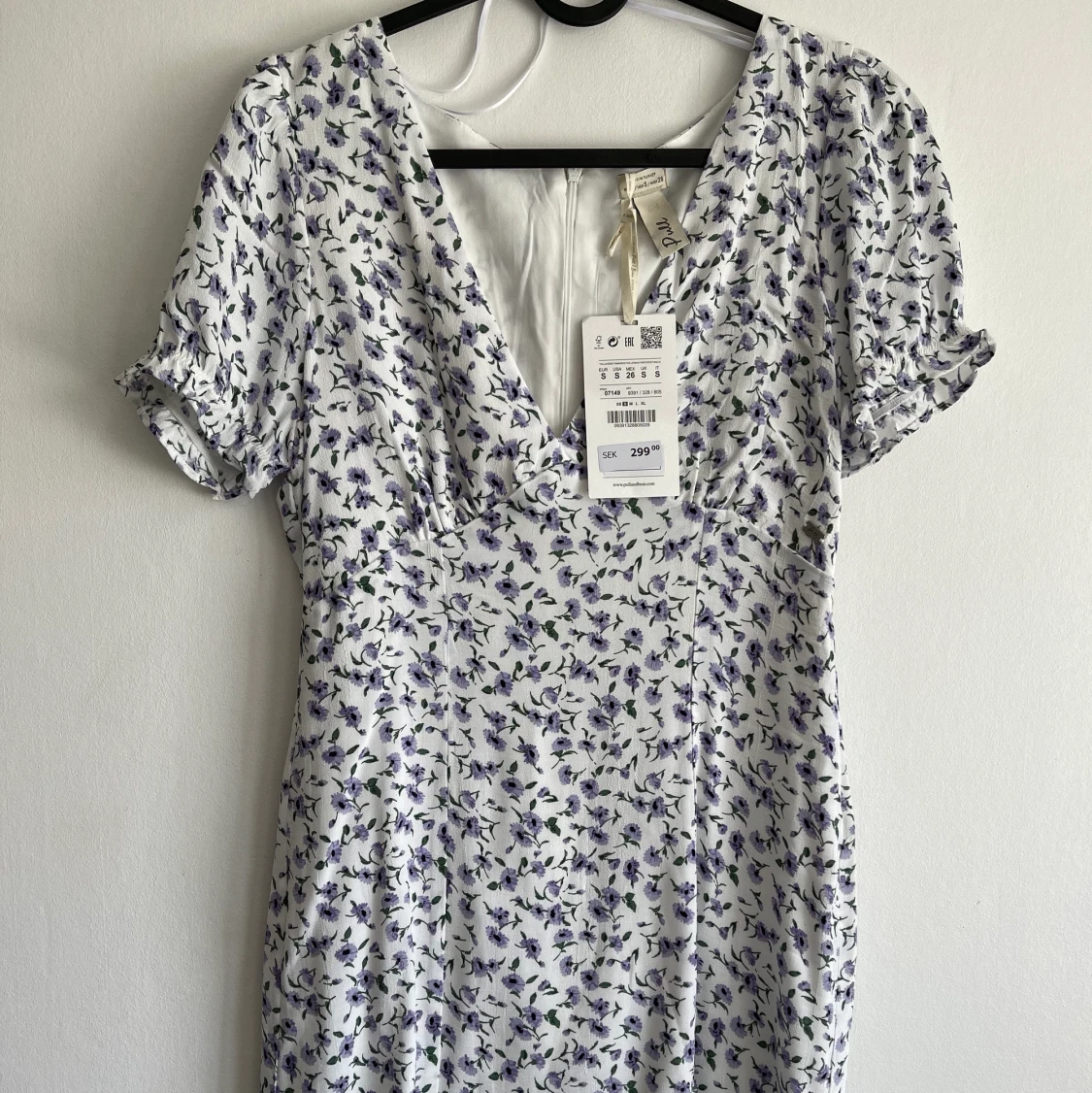 Blommig klĂ€nningđž