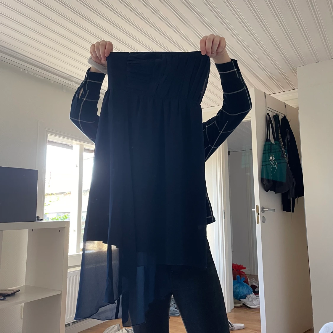 Klämmig, blus och en T-shirt i fint skik