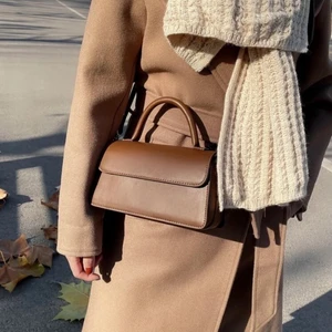 Brun väska - Säljer en oanvänd väska eftersom den inte kommit till användning:) (bilden är lånad, skickar såklart en riktig bild vid efterfrågan) 