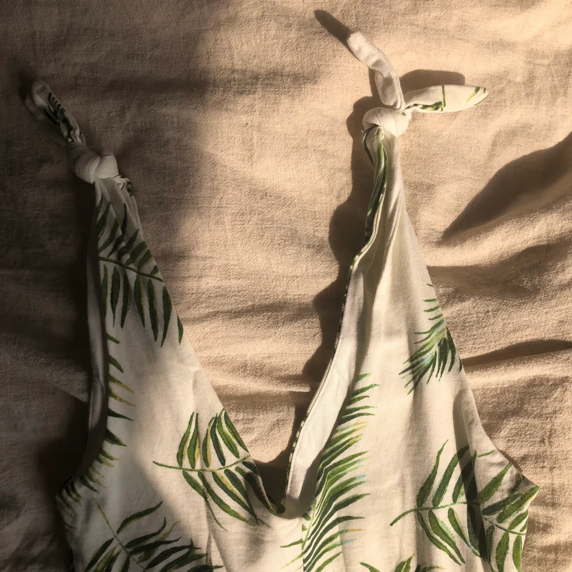 Mönstrad body från HM storlek XS