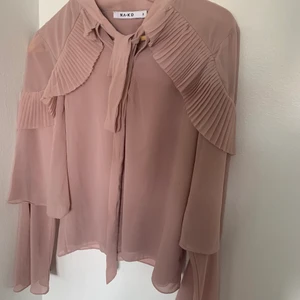 Blus i jättefin färg - Använd en gång 