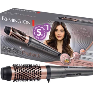Remington värme borste  - En super bra värme borste som ger ett vackert svall och kan forma lockar! En felköpt julklapp som är använd endast en gång! Orginal pris 500! 
