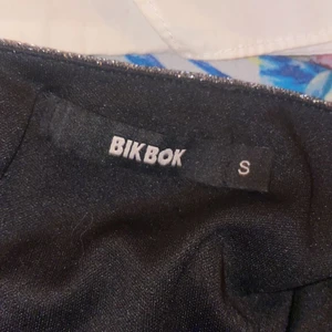 En fin glittrig body  - Aldrig använt, storlek S