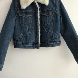Levi’s demin jacket with fur  - I wore it a few times only, it’s a bit tight for me 