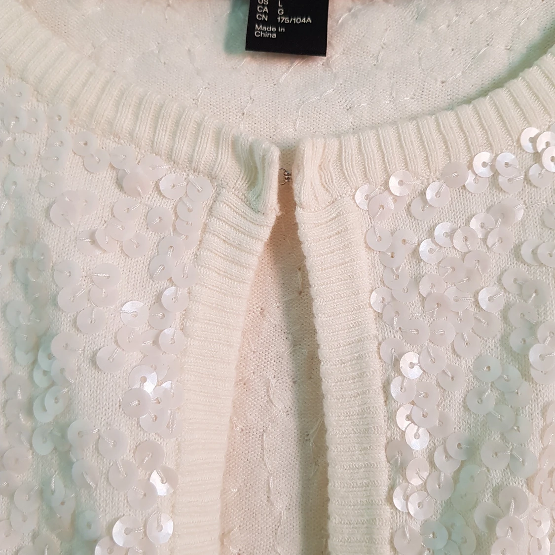 Kräm vit kofta med paljetter  - 90