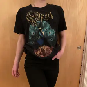 Really pretty Opeth Band T-shirt with a peecock.