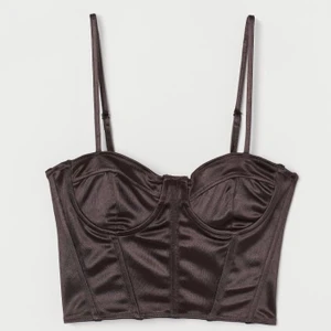 Korsett - Brun korsett storlek 36, säljer pga att den köptes i fel storlek. 