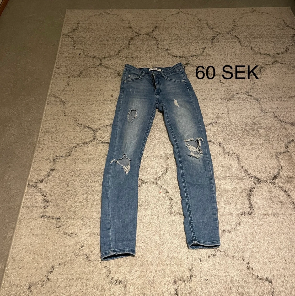 Jeans med hål i 