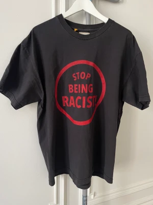 Gallery Dept. Stop Being Racist Tee - Gallery Dept. Stop Being Racist Tee  Size Large Gently used like new  Bought from their website. Comes with original receipt and everything that came with the original purchase.