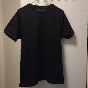 Size S lightly used in good condition black t-shirt 