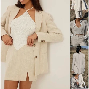 Melange Regular Blazer - Kavajen är i storlek 34, och är normal i storleken. Den är helt oanvänd, prislappen hänger kvar. 