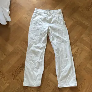 Lösa beig/vita Jeans