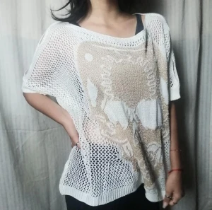 Grunge knitted see through top - Condition: 10/10 Never used, still looks bnew.