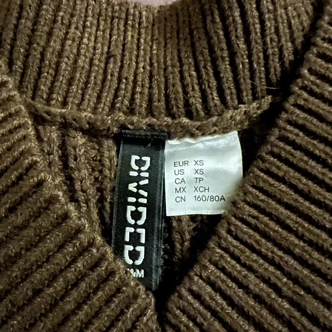 Stickad kort väst - 90