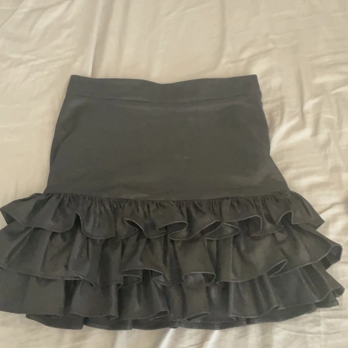 Glittrig volangkjol - 90