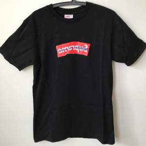 Supreme x CDG / Comme Des Garçons Split Box Logo T-Shirt  Size small, fits true to size mens small.  Great condition, no flaws or damage.  DM if you need exact size measurements.   Buyer pays for all shipping costs. All items sent with tracking number.   No swaps, no trades, no offers. 