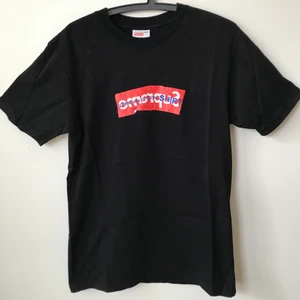Supreme x CDG Box Logo T-Shirt - Supreme x CDG / Comme Des Garçons Split Box Logo T-Shirt  Size small, fits true to size mens small.  Great condition, no flaws or damage.  DM if you need exact size measurements.   Buyer pays for all shipping costs. All items sent with tracking number.   No swaps, no trades, no offers. 