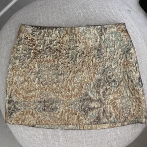 Golden skirt zara  - Golden embroidered skirt from zara. Worn once . Size medium but runs small so can fit small as well. Originally bought for 70euro 