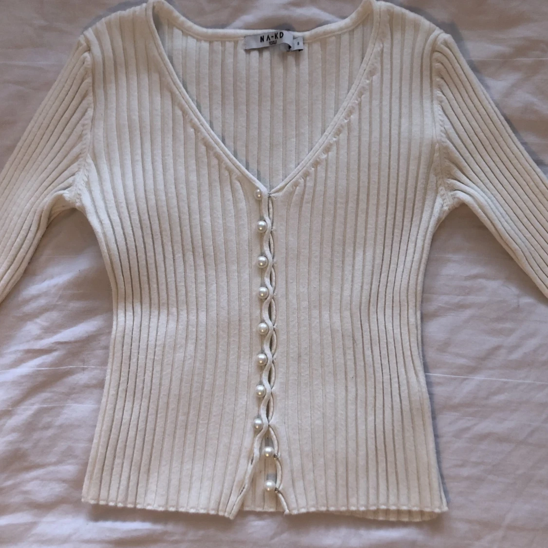 Trendig ribbstickad tröja - 90