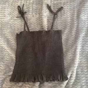 Ett svart ribbat linne från Lindex i storlek S. Aldrig användt.🦊