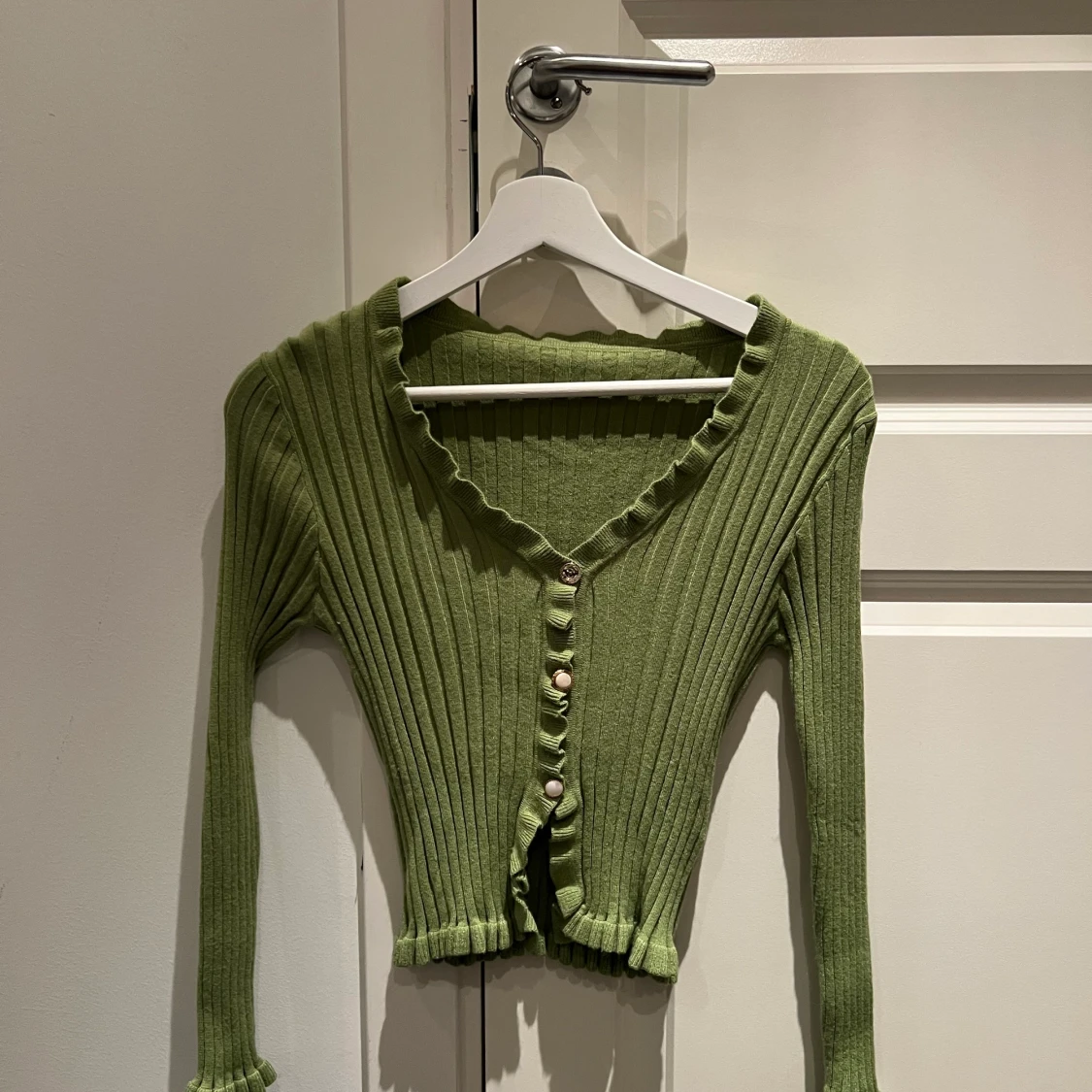 Grön stickad tröja