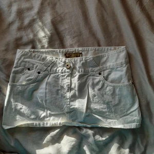 Mini vit kjol  - Mini vintage vit kjol. 