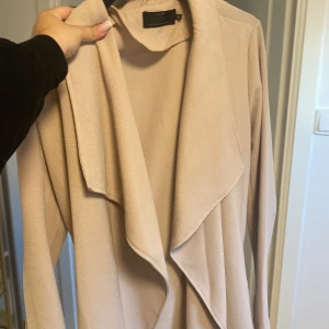 Trenchcoat beige  - Använd fåtal gånger 