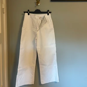 Vita kostymbyxor  - Vita kostymbyxor, storlek L