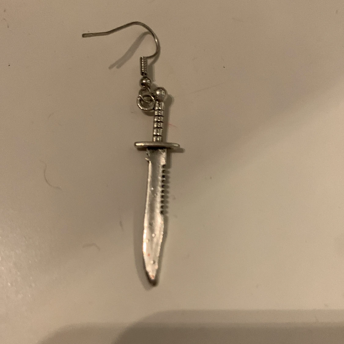 Säljer dom här kniv öron hängarna  - 91