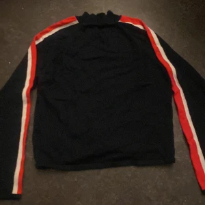 Polo tröja  - En polo tröja 