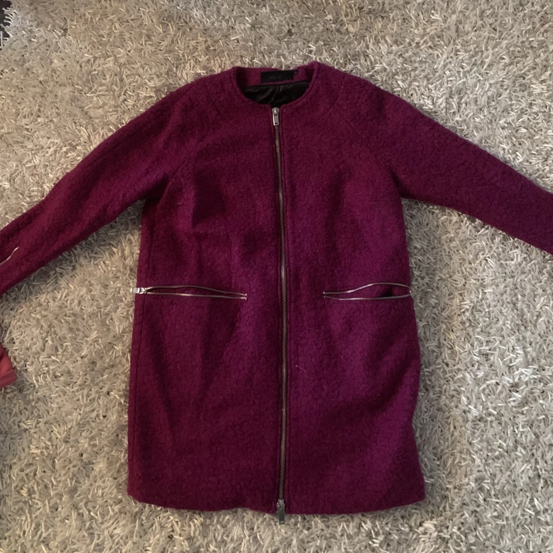 Lila kappa från Ellos 