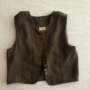 Väst - Najs väst köpt second hand. Står ingen storlek men skulle säga att den passar xs-s. 