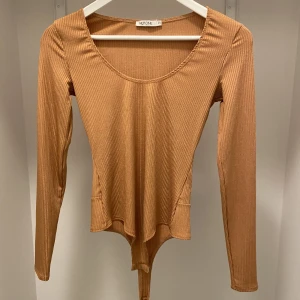 Nelly body - Säljer pga den inte kommit till användning. Storlek xs