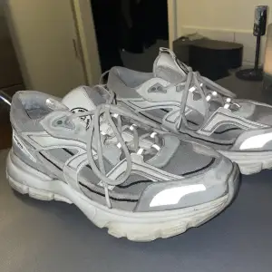 White Axel Arigato sneakers (marathon runner model) with reflective details, size 41 (I’m in between 41/42 normally).