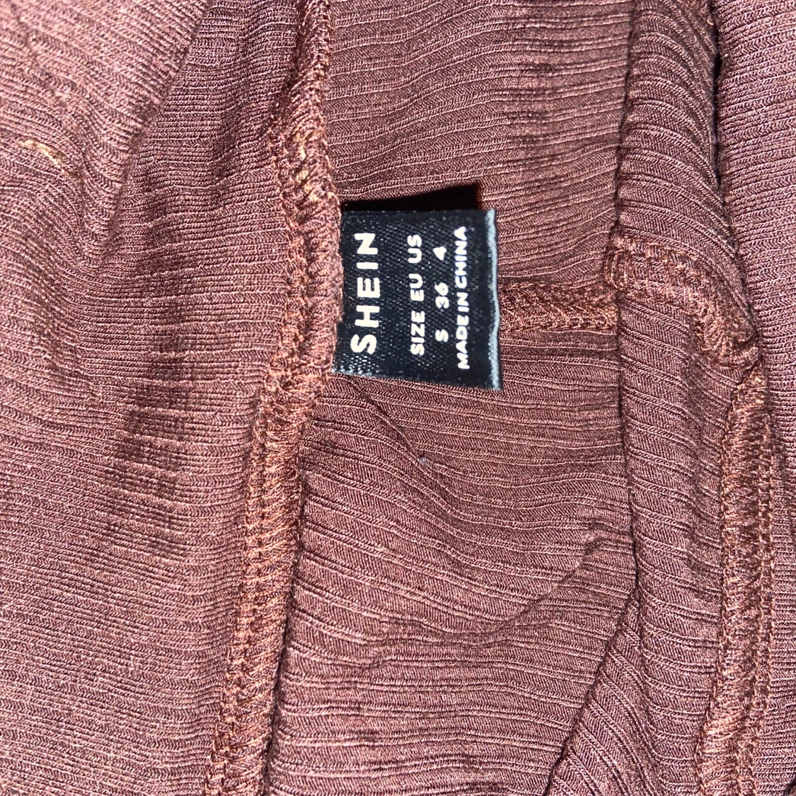 Bruna utsvängda ”tights” - 91