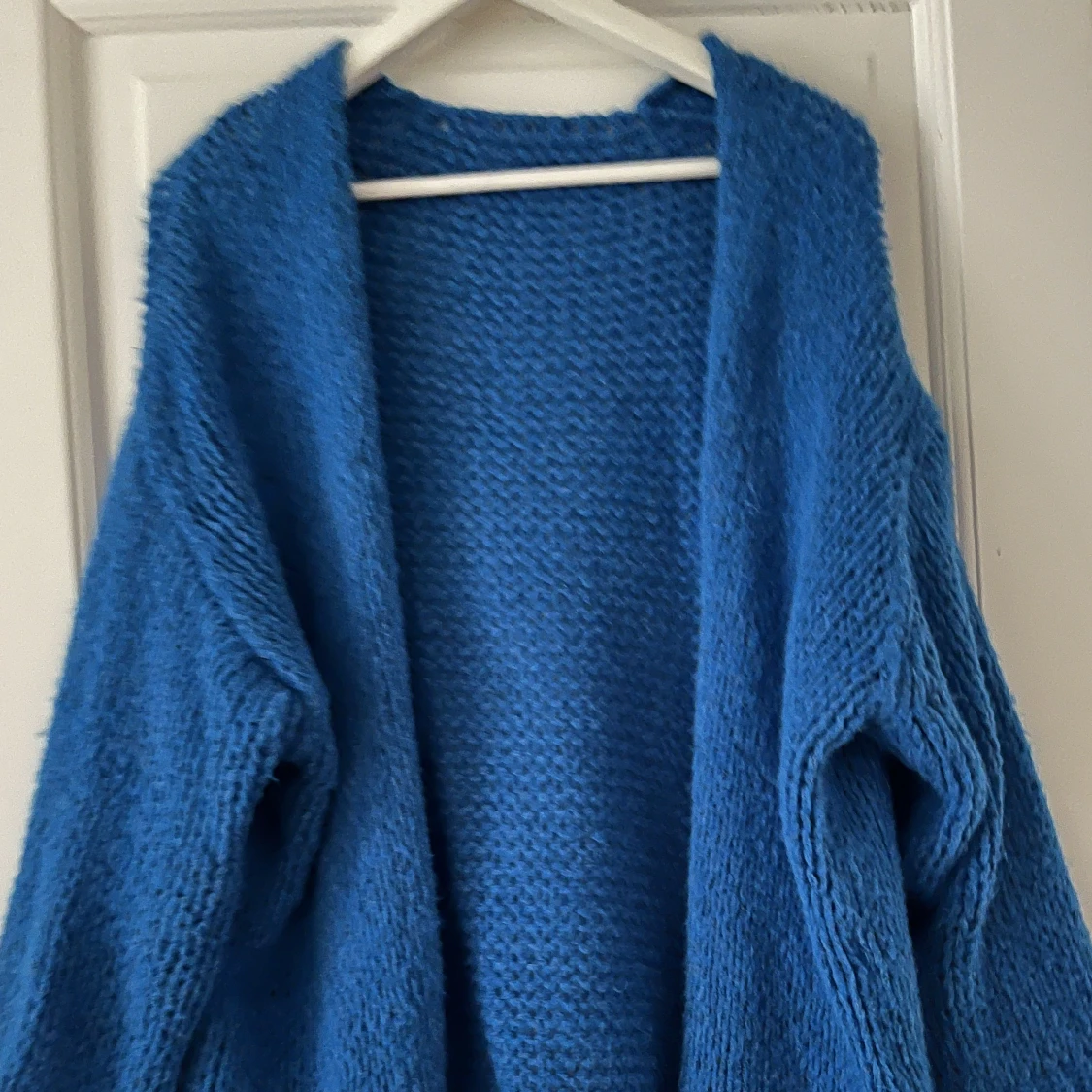 Blå stickad kofta  - 90