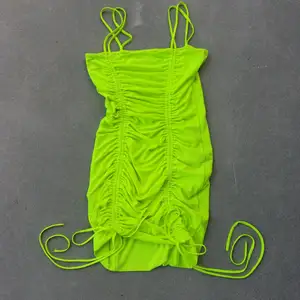 Neon Yellow Mini Dress. Purchased Manhattan Beach, Los Angeles. Needs a wash but is in good condition.