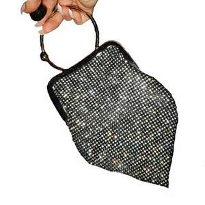 Y2k Style Rhinestone Purse with bracelet style clasp. Purchased from Dollskill