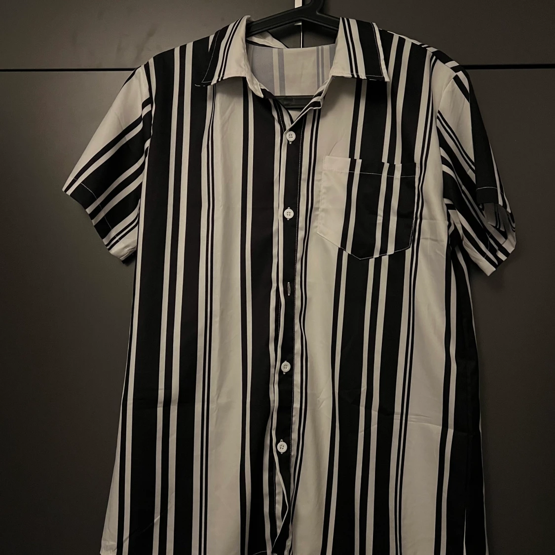 Skjorta med tillhörande shorts storlek S