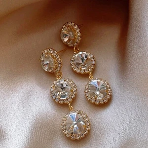 ÖRHÄNGEN - Örhängen guldiga med silvriga stenar.  