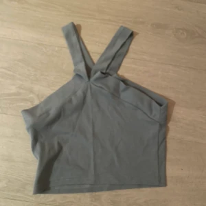 Blå topp - Passar xs/s då den är väldigt elastisk 