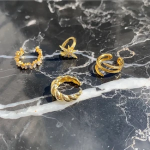 Earcuffs äkta guld oanvända - Äkta guld, helt oanvända! 12kr frakt  Den längst ner är slutsåld.