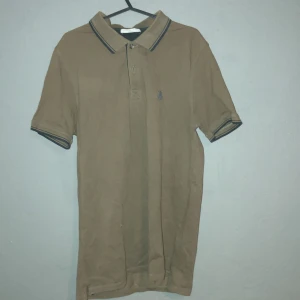 Piké kortärmad  - Storlek M, använd 