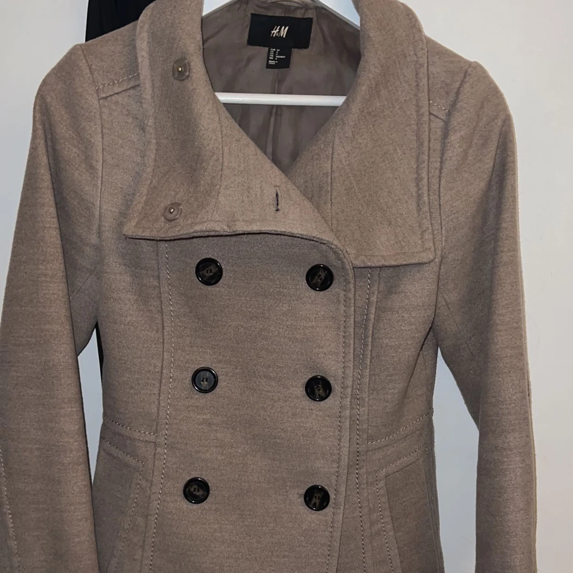 Beige kappa från hm