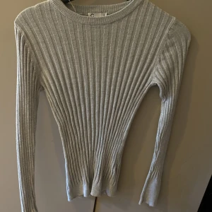 Fin tröja  - En tröja som jag köpt men aldrig använd.